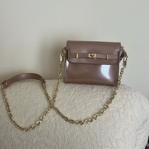 BEBE Elegant Pink Handbag with gold chain, crossbody bag. Worn on the cruise
